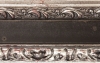 Argent� motifs vieillis et centre noir mouchett�, invers�  90X43 mm