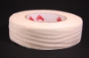 1 Rouleau adh�sif, fibranne blanche 38 mm X 50 m.